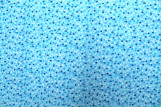 Tissu Popeline Coton Imprimé Fleur Nano Turquoise -Au Mètre