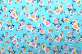 Tissu Popeline Coton Imprimé Fleur Maya Turquoise -Au Mètre