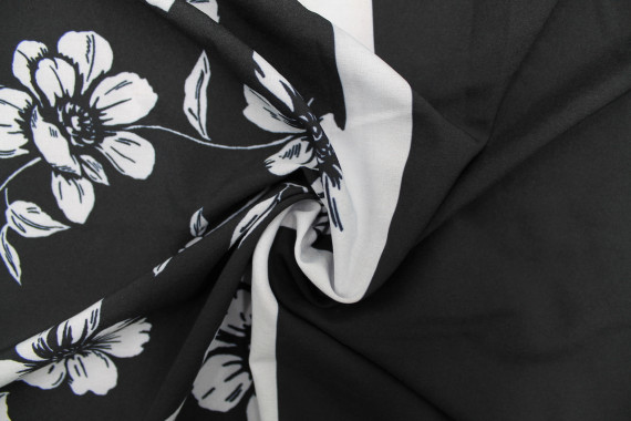 Tissu Polyester Extensible Noir Imprimé Fleurs Blanc -Au Mètre