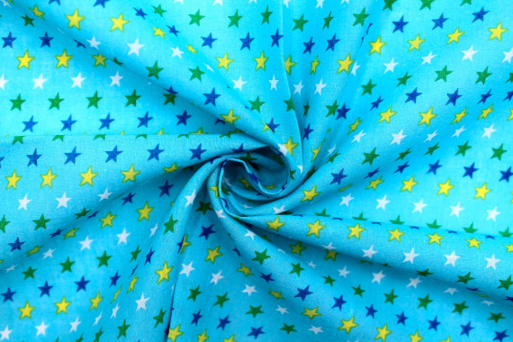 Tissu Popeline Coton Imprimé Fond Turquoise Étoiles colorées -Au Mètre