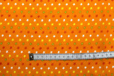Tissu Popeline Coton Imprimé Fond Orange Étoiles colorées -Au Mètre
