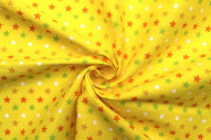Tissu Popeline Coton Imprimé Fond Jaune Étoiles colorées -Au Mètre