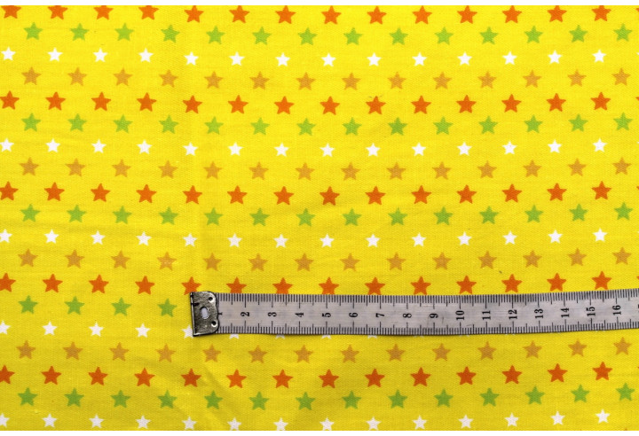 Tissu Popeline Coton Imprimé Fond Jaune Étoiles colorées -Au Mètre